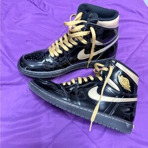 Jordan High-Top Sneakers in Black & Gold